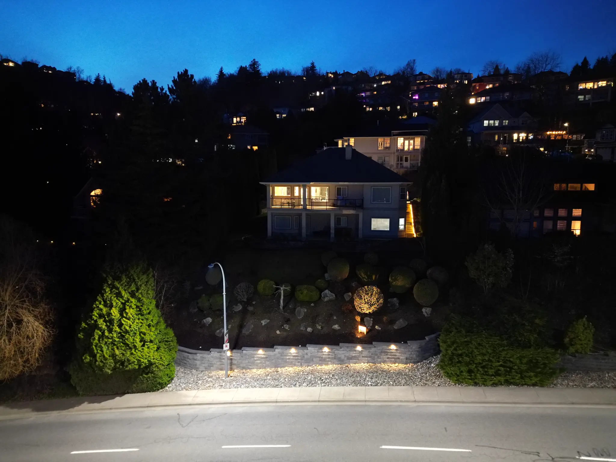 Aerial drone view of retaining wall and property