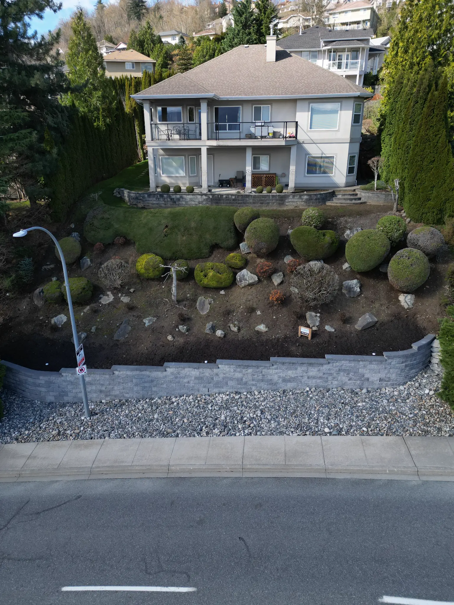 Drone view of retaining wall along property edge