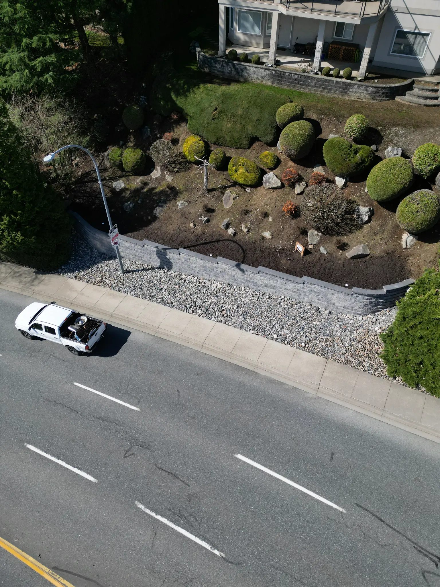 Wide aerial of retaining wall with Fraser Valley views