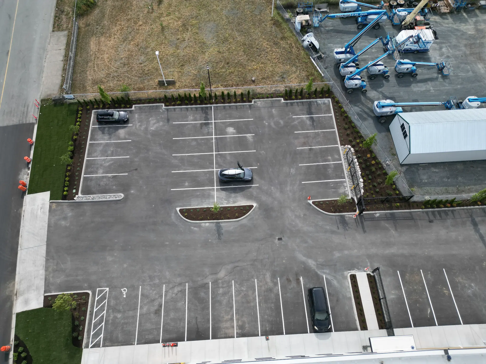 Aerial view of the completed parking lot and surrounding commercial landscaping