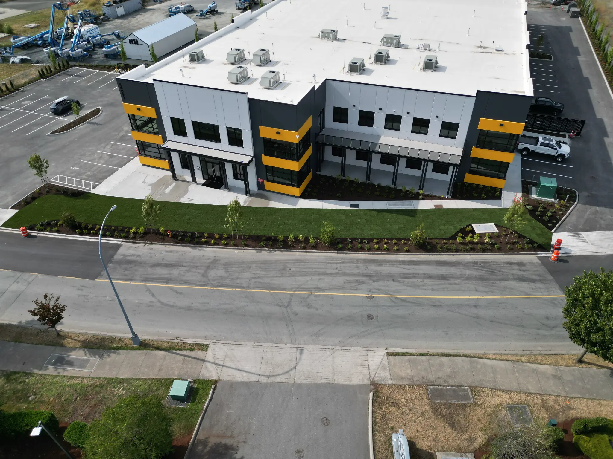 Completed Jake's commercial building with fresh sod and professional landscaping
