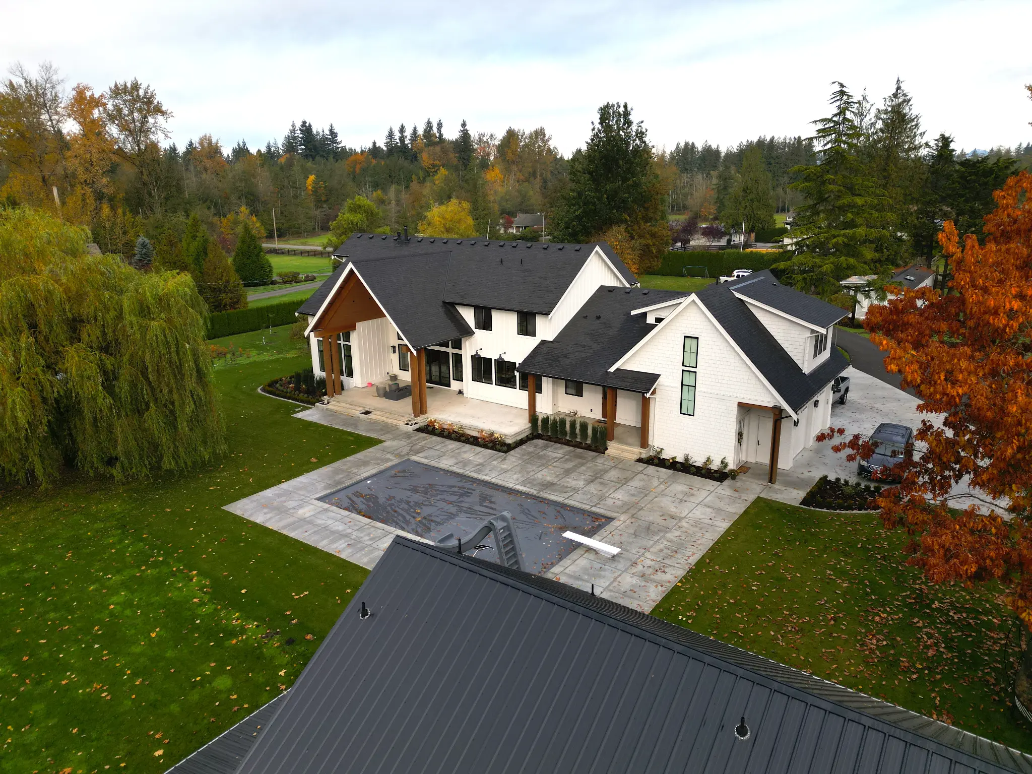 Aerial view of the Langley mansion and surrounding landscaped property