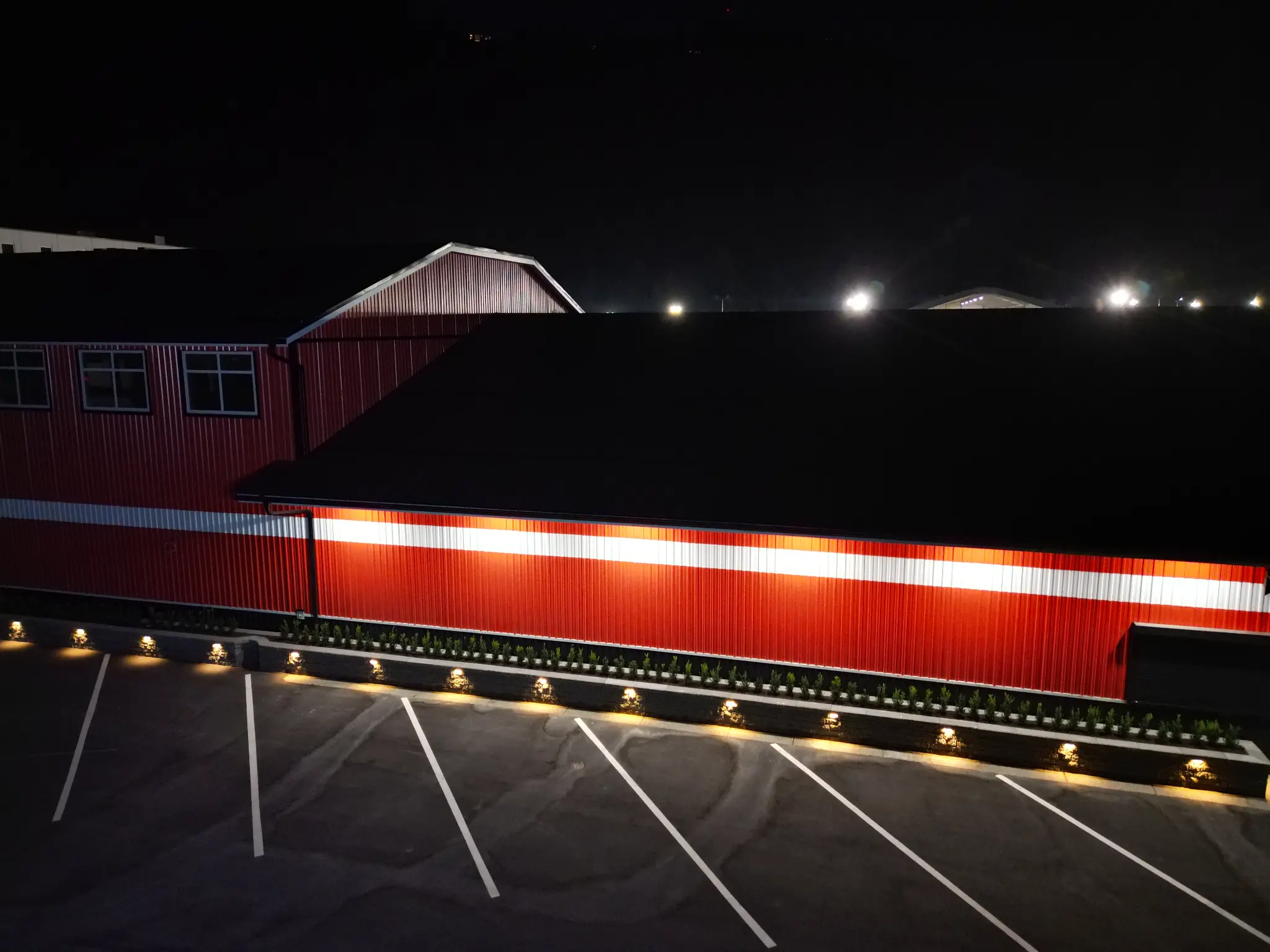 Aerial view of the North Coast planter wall and parking stalls at night