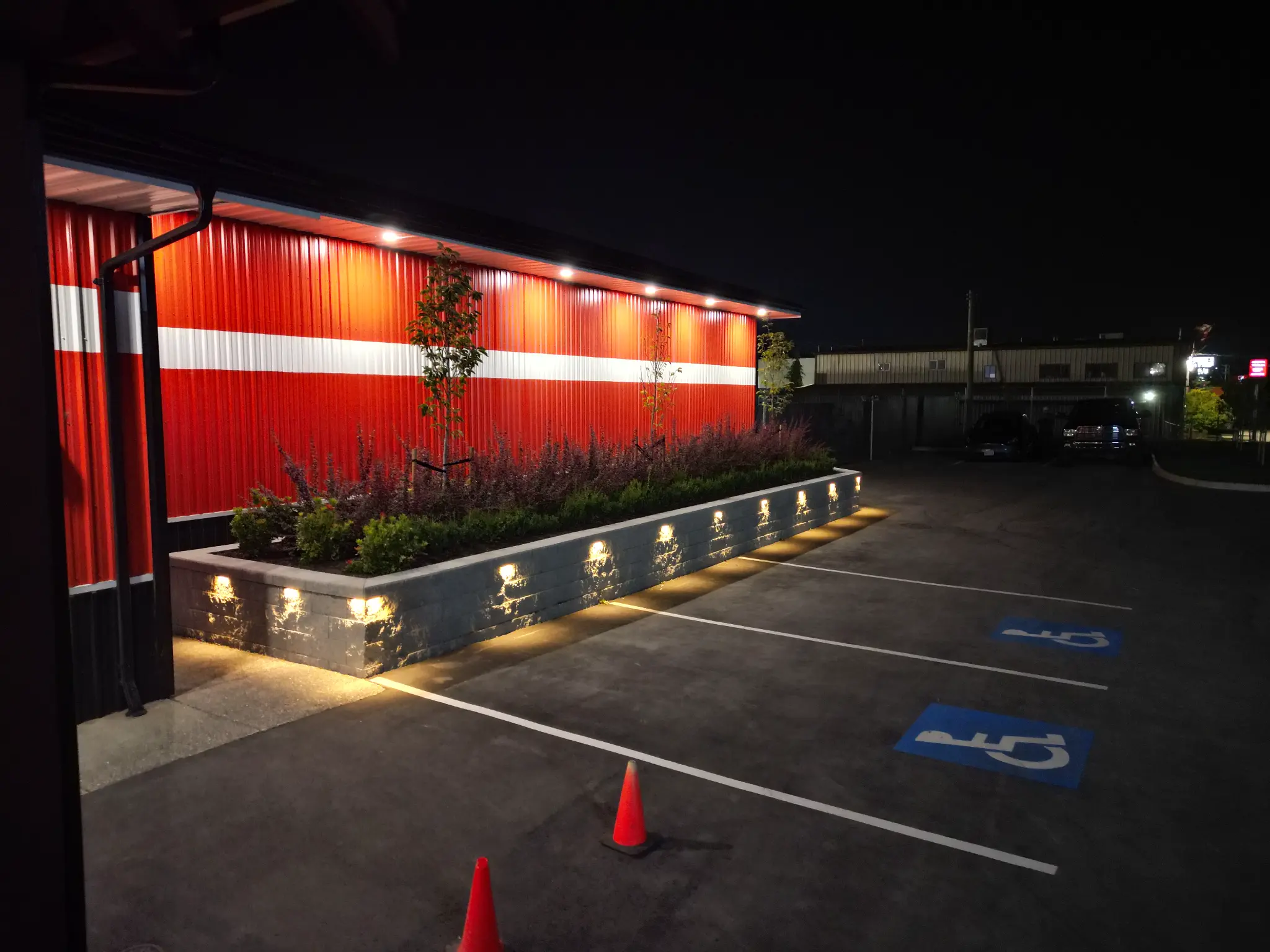 Commercial masonry planter wall with integrated lighting