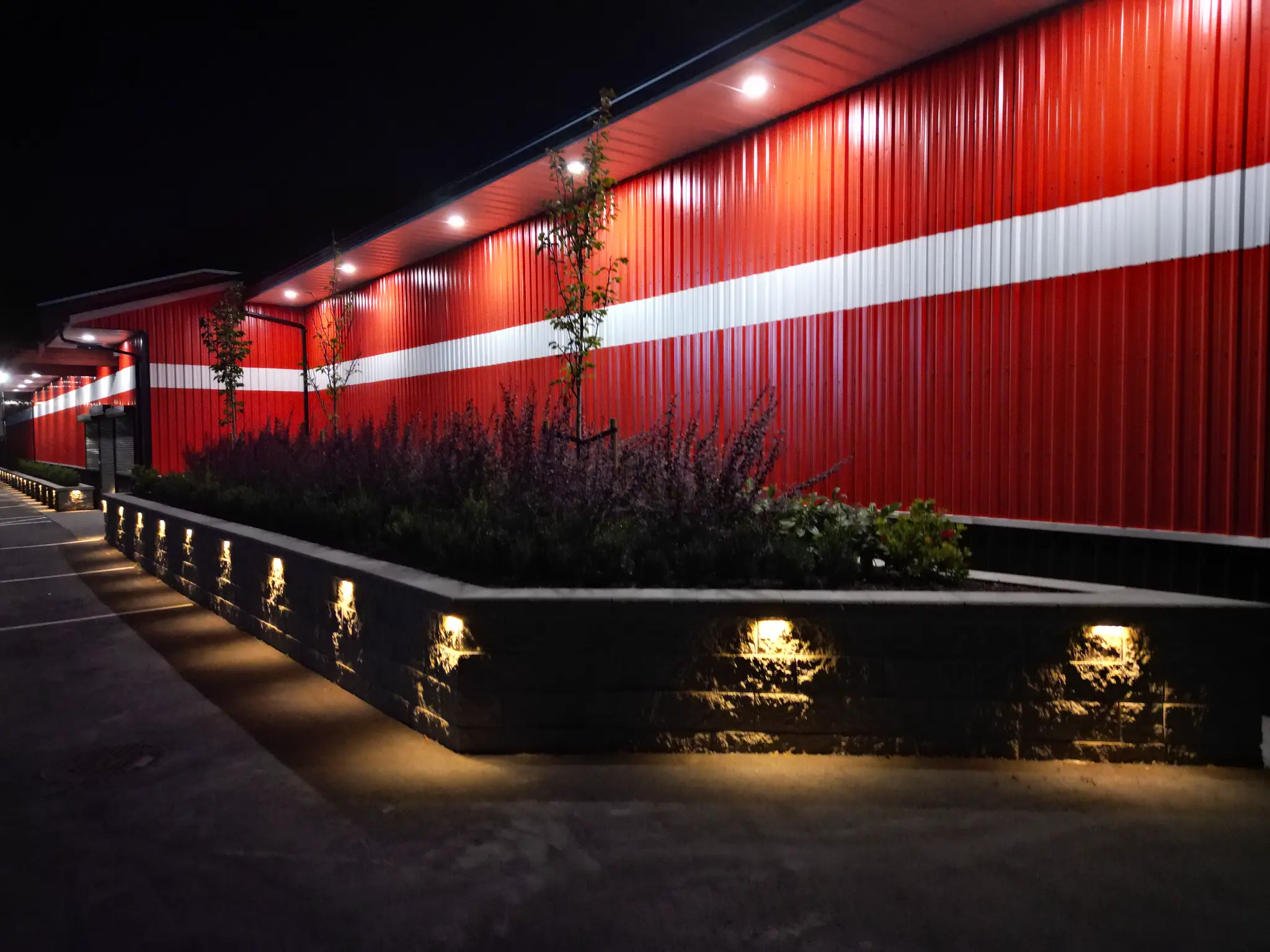 Close-up of the North Coast raised planting bed with architectural lighting