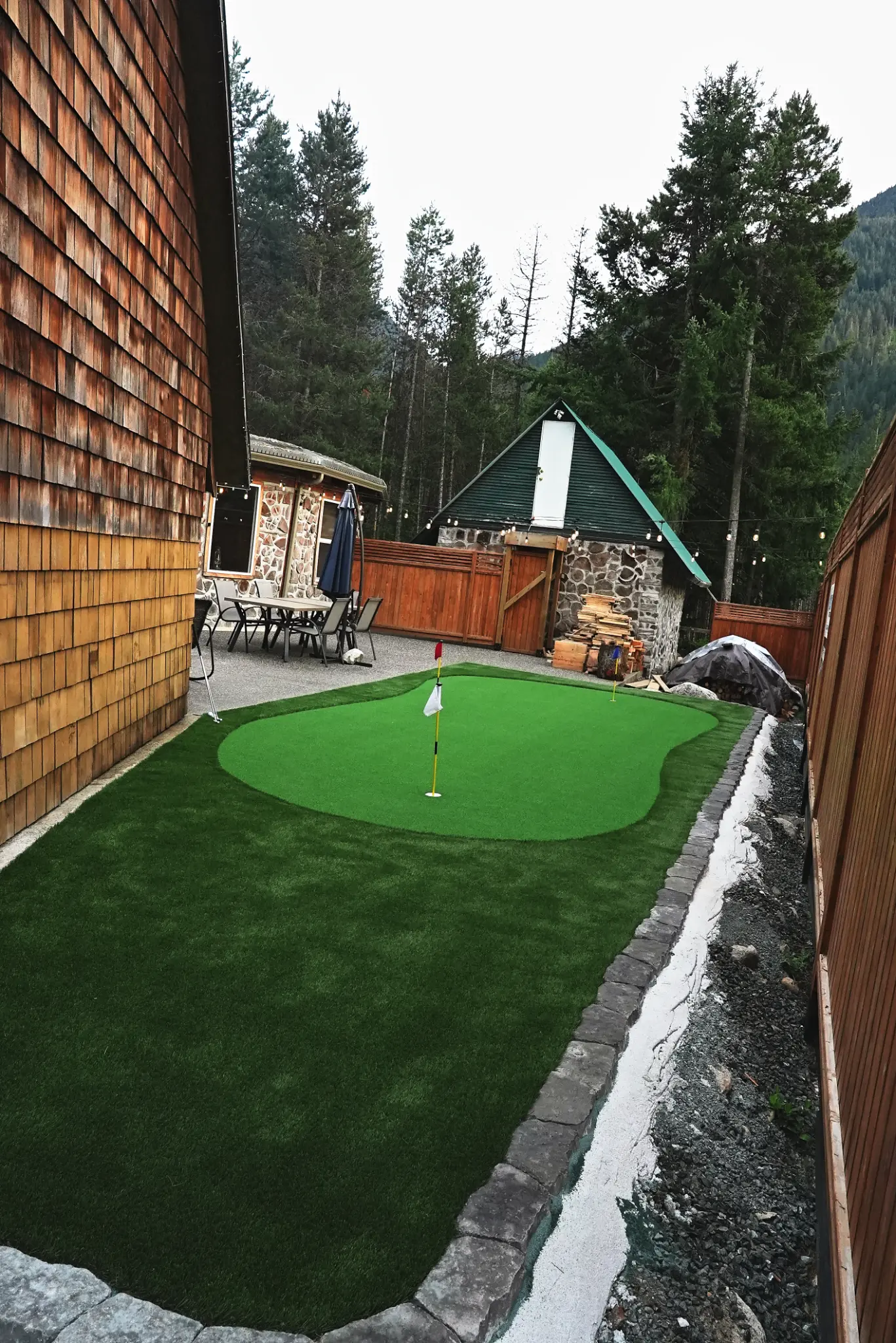 Artificial turf area with rock features