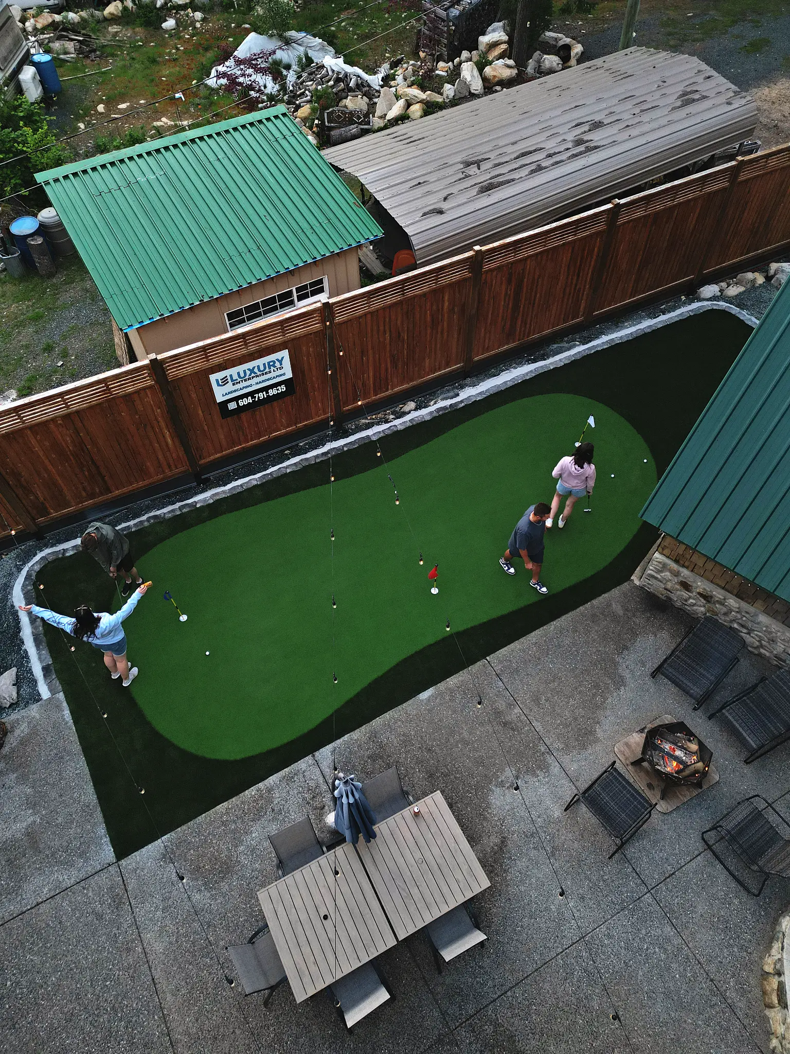 Wide aerial of property with landscaping