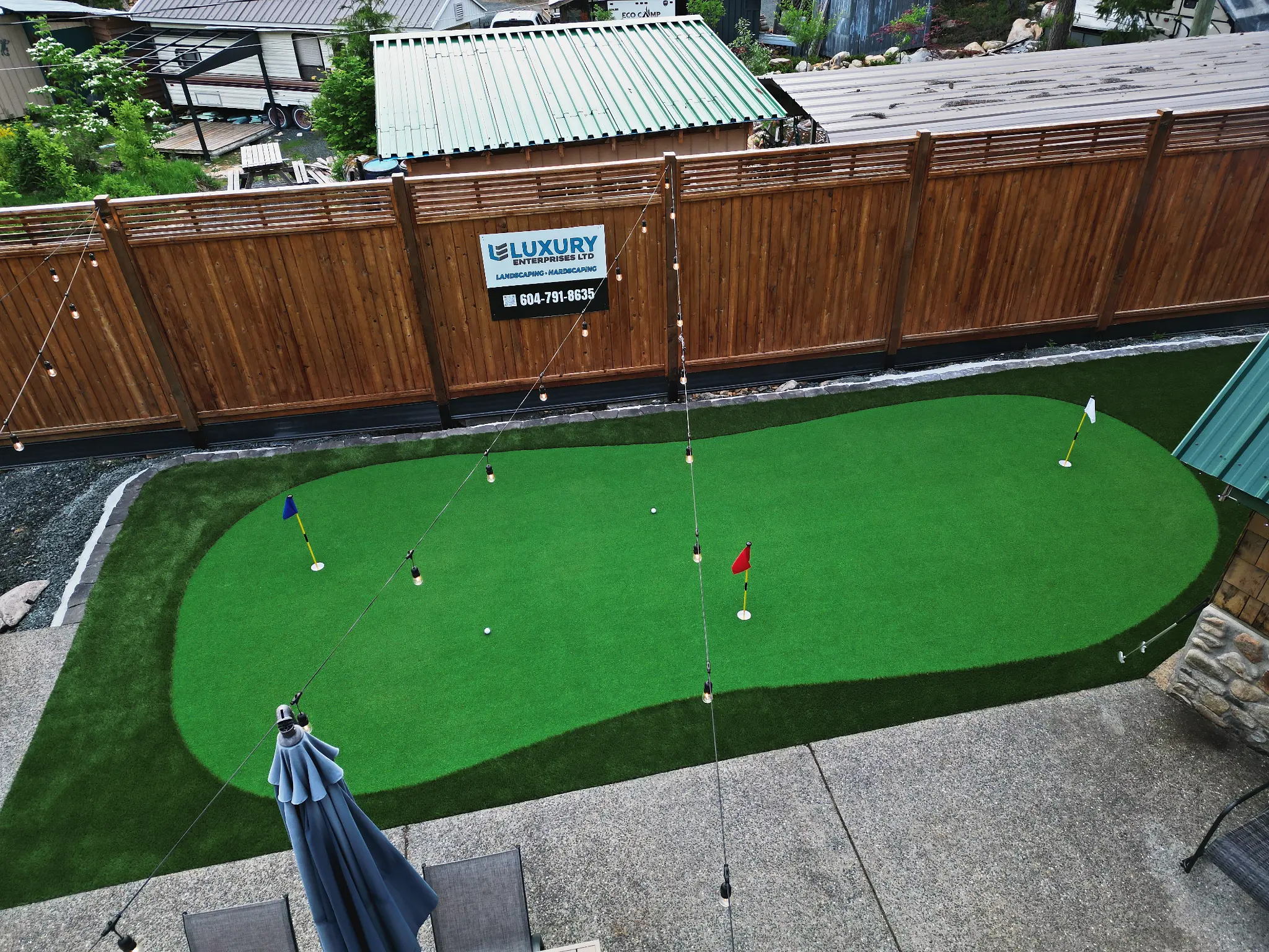 Wide drone view of property and surroundings